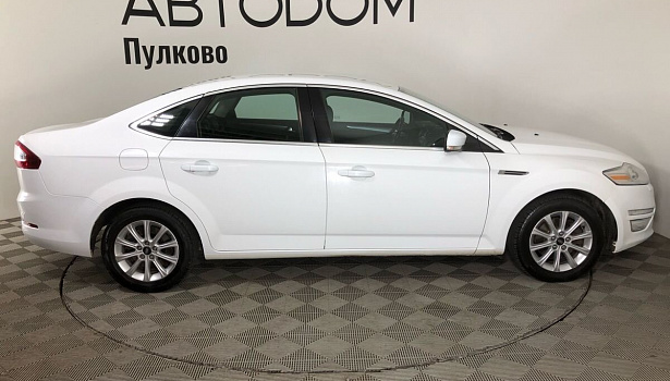 Ford Mondeo 2.0 4WD Седан Ghia (145 л.с.) фото 5