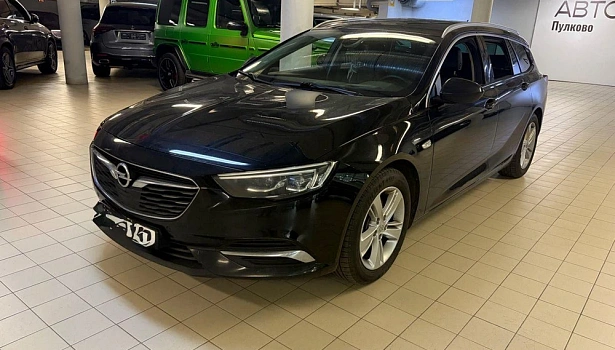 Opel Insignia 2.0d 4WD Универсал (170 л.с.) фото 25