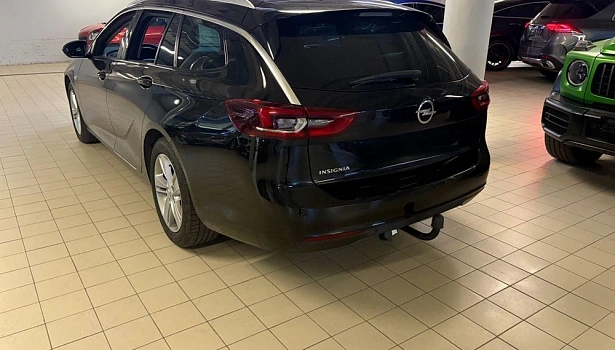 Opel Insignia 2.0d 4WD Универсал (170 л.с.) фото 26